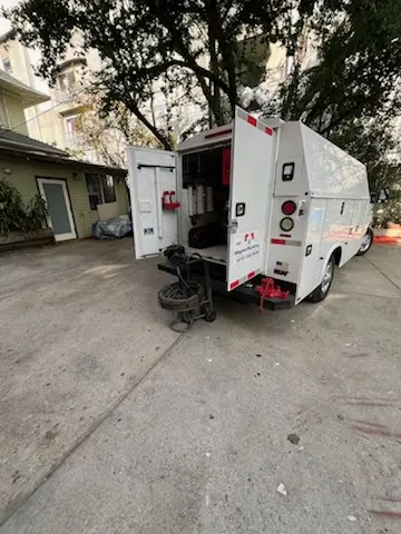 Magnet Plumbing service vehicle on-site for Grease Trap Cleaning in Harbor Isle